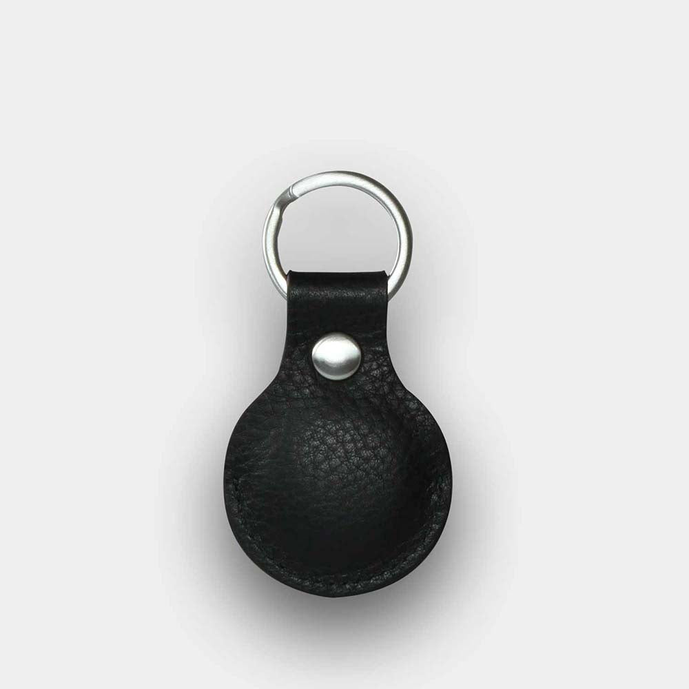 Rückseite eines schwarzen Schlüsselanhängers für den Apple Airtag mit Schlüsselring